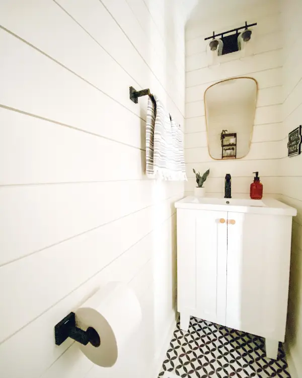 how to make a small half bathroom look bigger