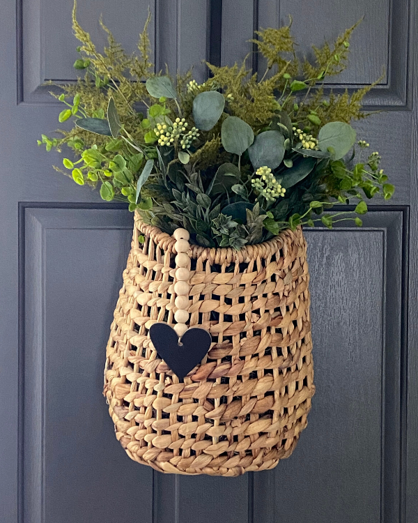 This shows the DIY farmhouse beads with chalkboard heart tag, a simple way to decorate for Valentine's Day.