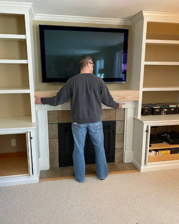 Fitting the new mantle top over the old one.