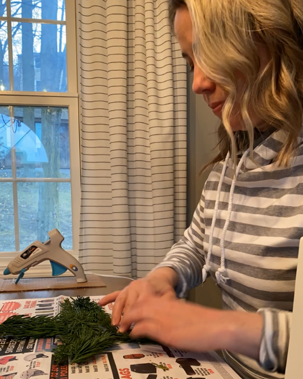 Gluing the pieces onto the star.