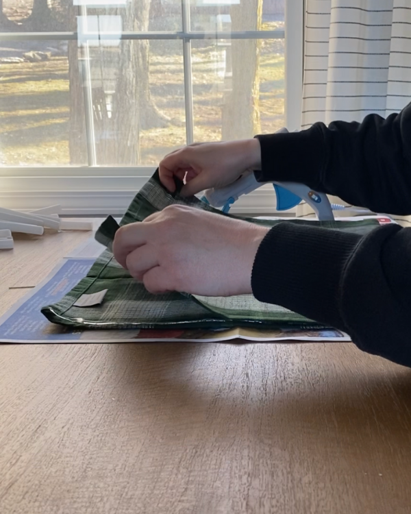 Making the diy no sew dish towel pillow