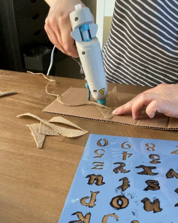 Glue the diamond in half to make the triangke part of the diy banner.