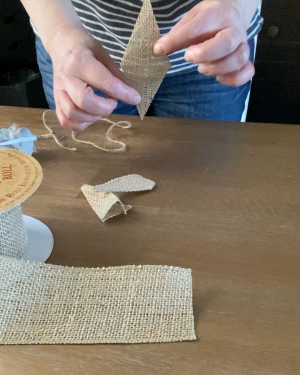 By cutting a triangle against the fold, you create a diamond.