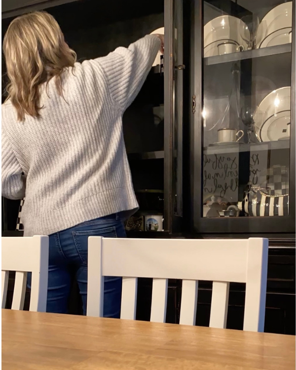 Emptying out the china cabinet to make it over.