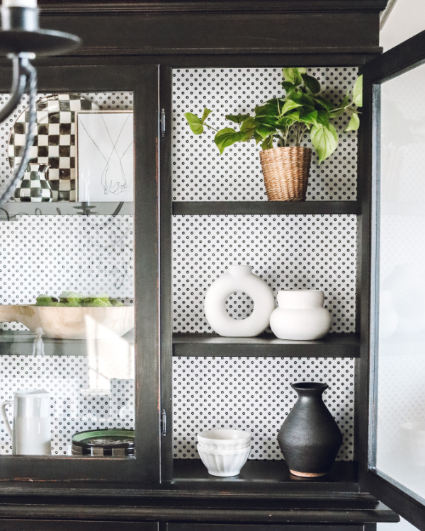 The wallpaper transformed the china cabinet