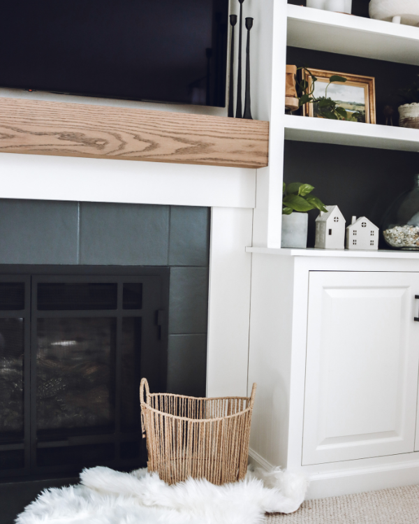 sheepskin rug in front of the fireplace
