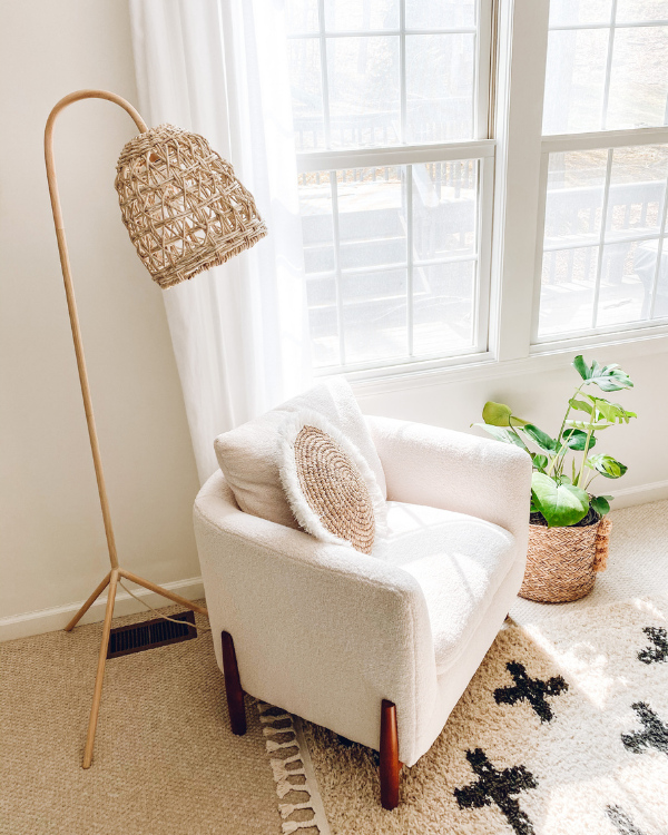 DIY no sew round throw pillow on a chair in the family room.