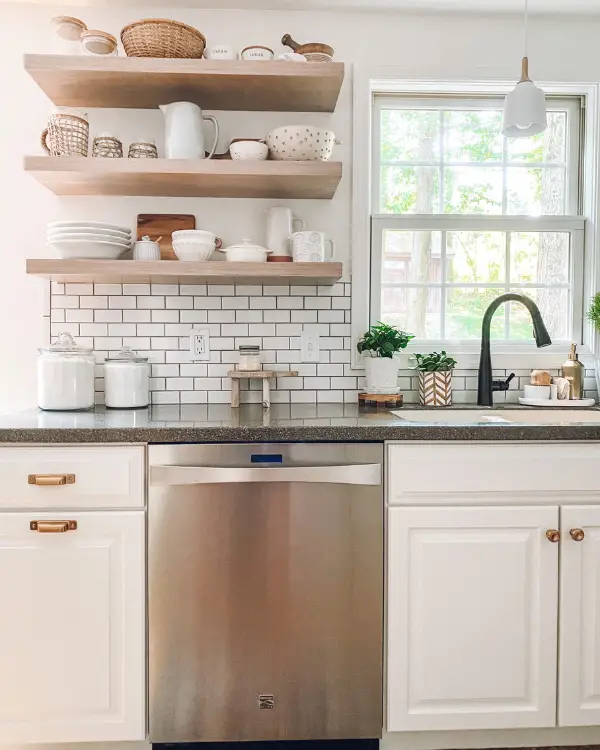 You can learn how to hang floating shelves and then put pretty objects on them like bowls, pitchers and collanders.
