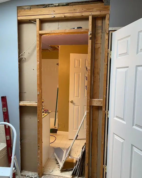 Bathroom Remodel: How to Fill in a Doorway with Drywall