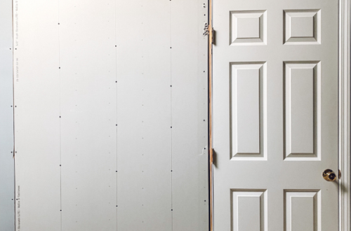 doorway filled in, covered with drywal