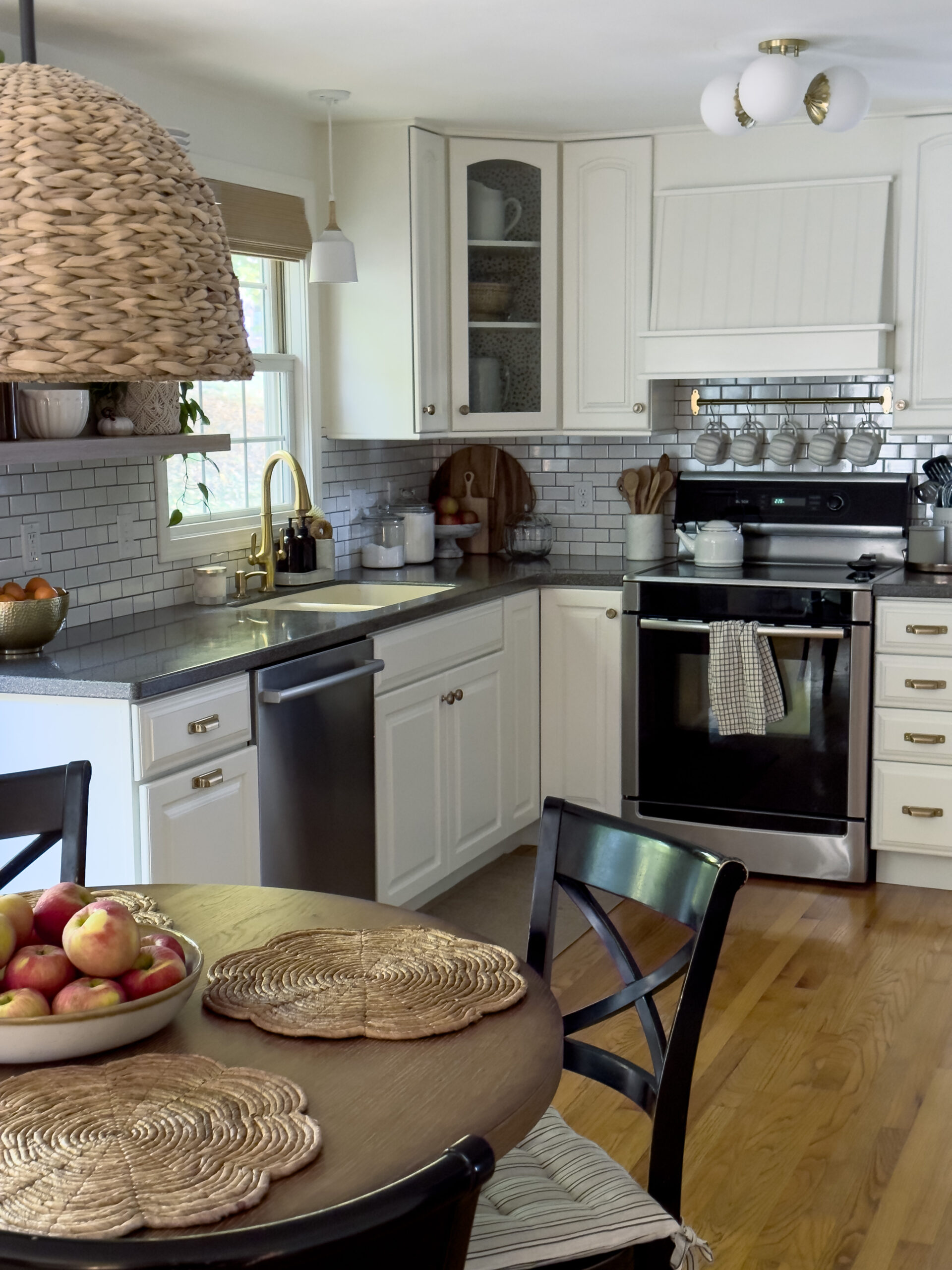 Display a row of white pumpkin mugs in the kitchen
