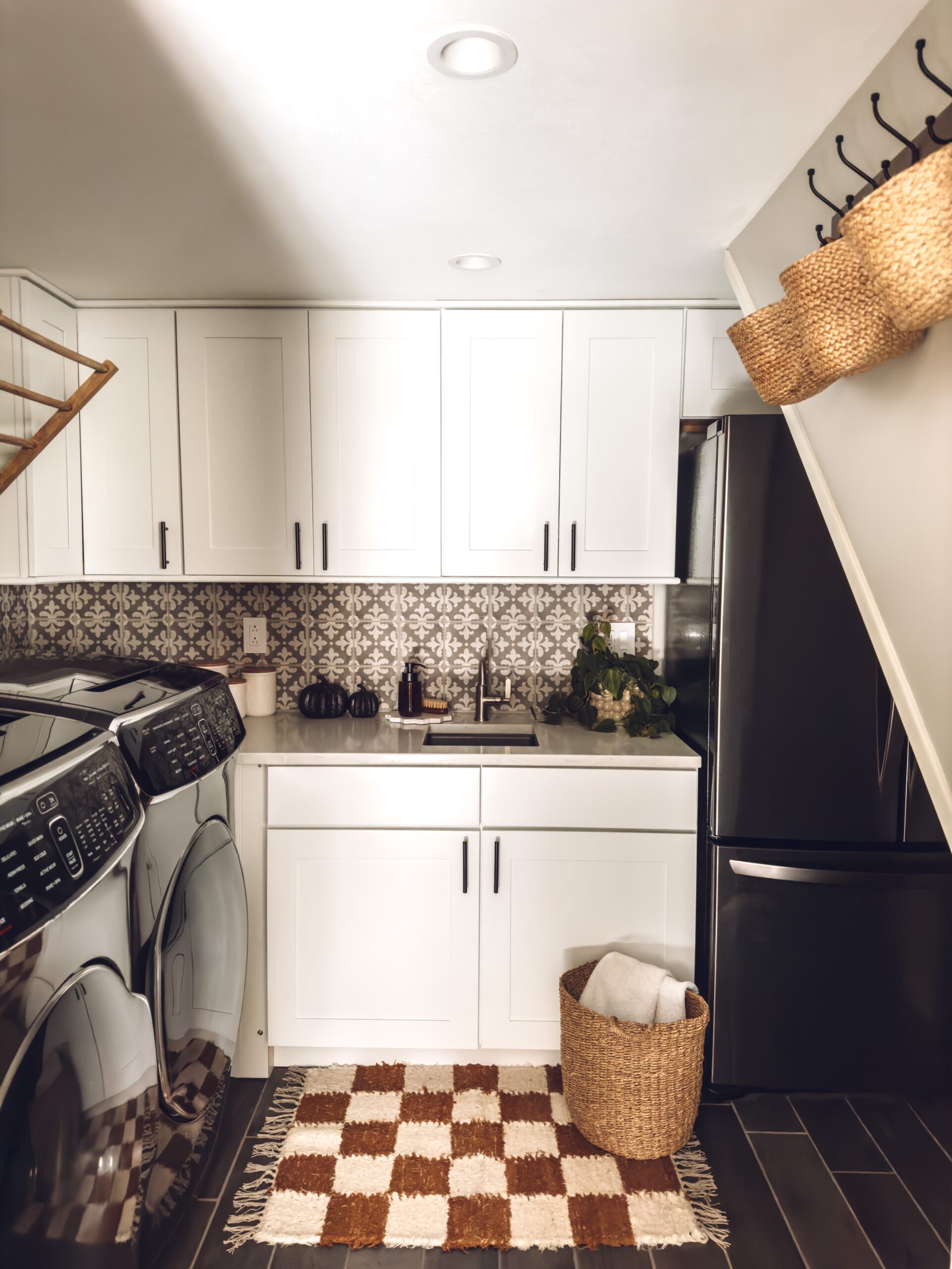 fall brown checkered rug on the laundry room floor