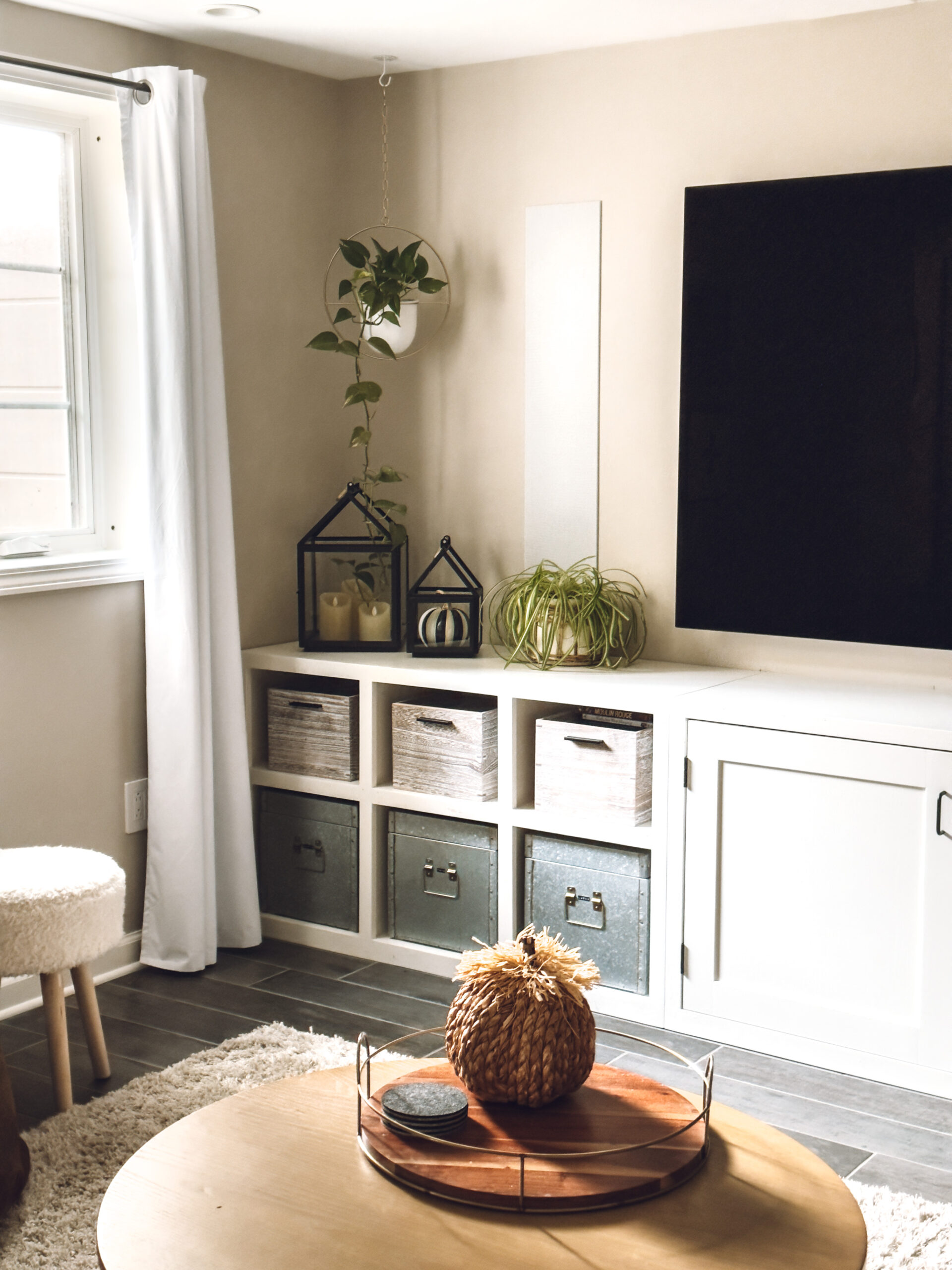 Place a pumpkin on a tray on the coffee table