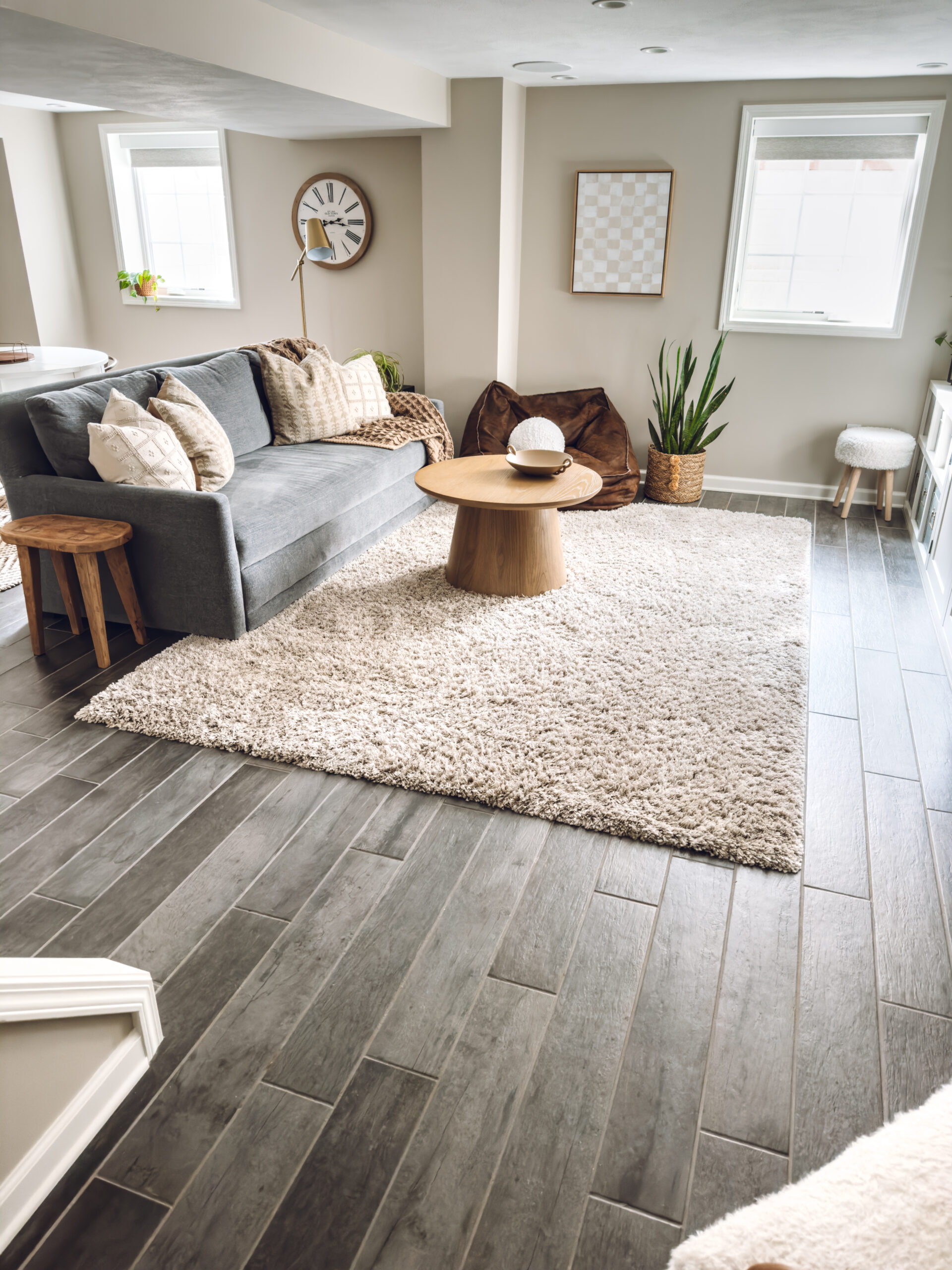 Window treatment idea: motorized shades! We had them installed in the basement.