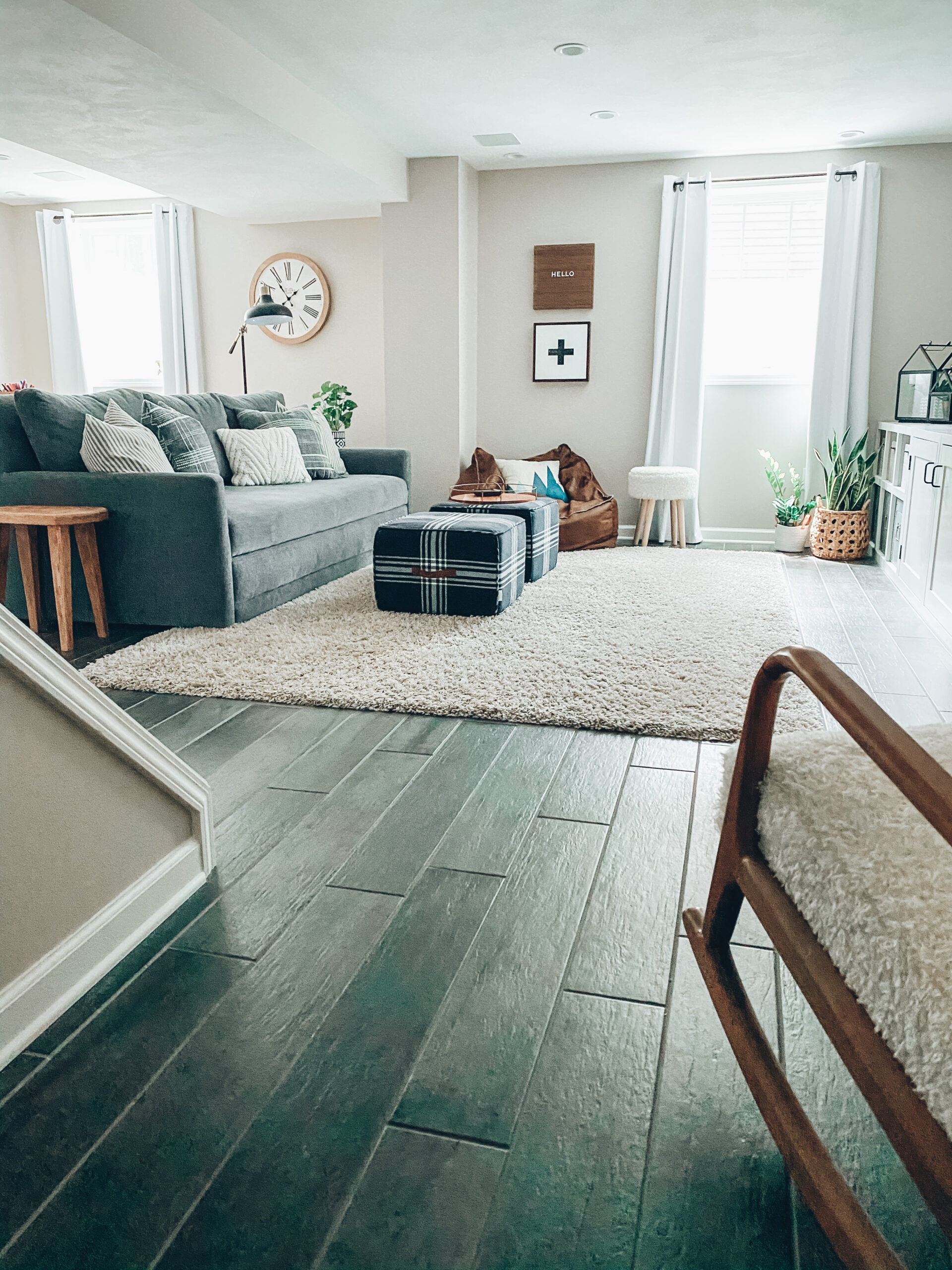 This is how the basement looked with long curtains before we replaced them with motorized shades.