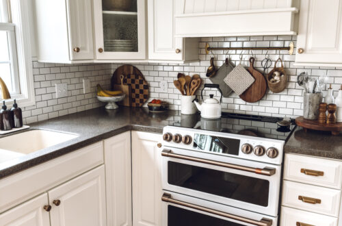 white electric GE Cafe stove in my white kitchen